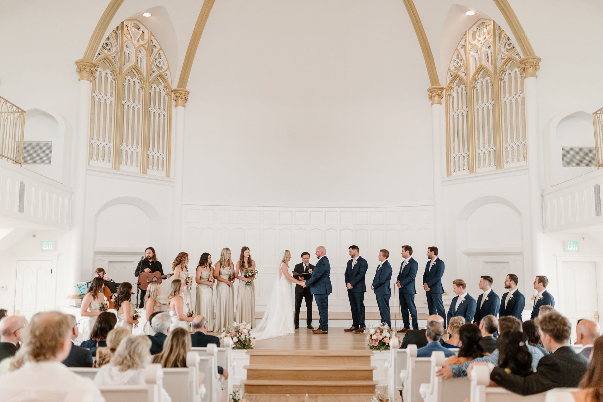 The aisle and vaulted ceiling of the Melrose Abbey ceremony space